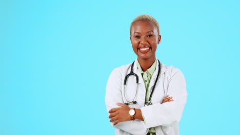 Woman-doctor-pointing-to-space-isolated-on-blue