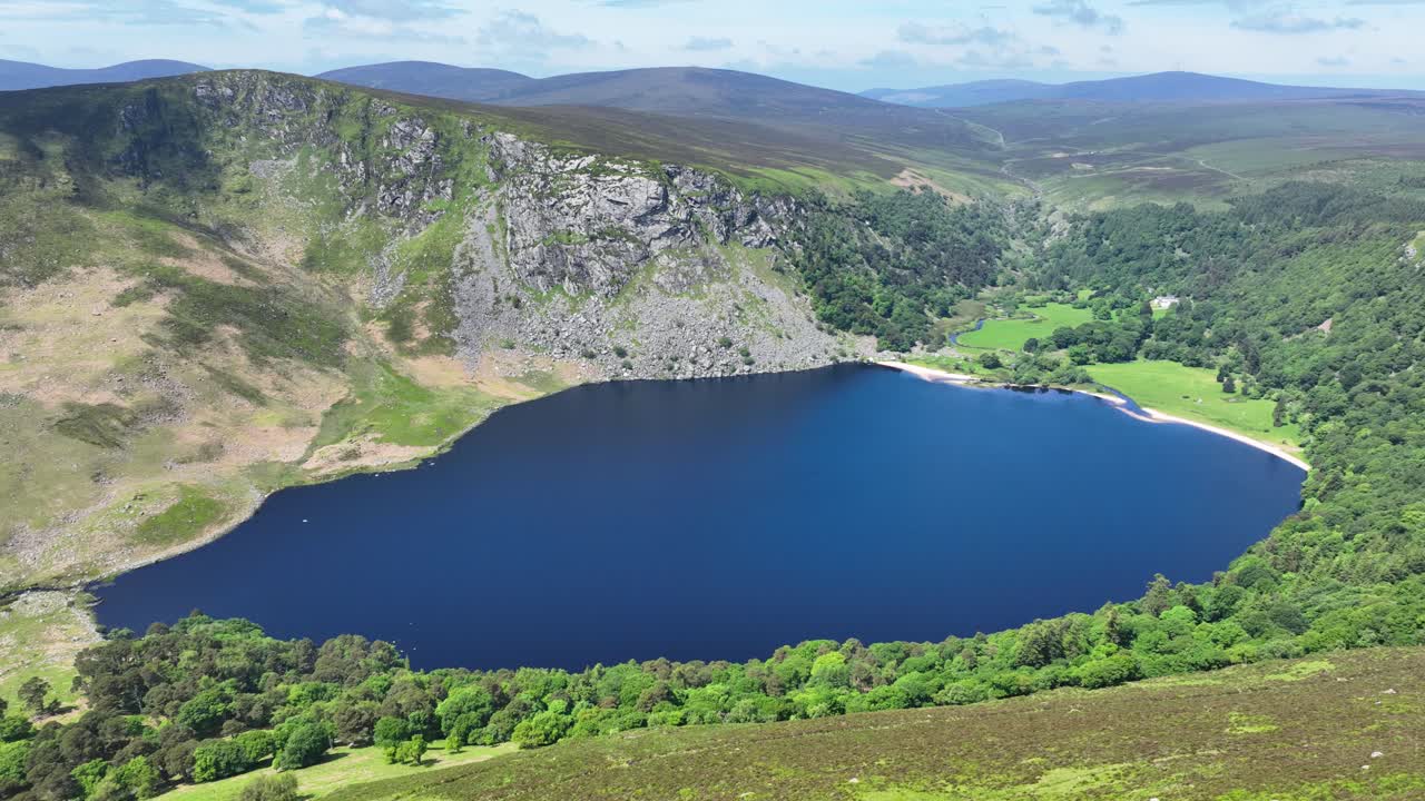 drone Wicklow Ireland Landscapes Lough Tay stunning tourist attraction in The Wicklow Mountains Ireland Epic Locations in summer