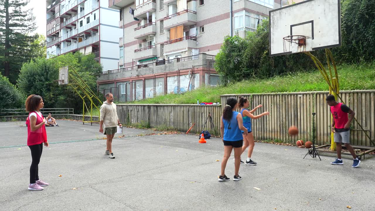 People Playing Basketball Outdoors
