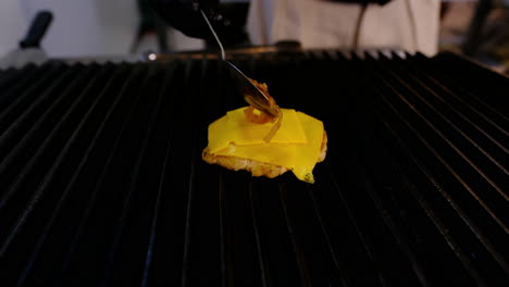 cheeseburger perfection: melting cheese on a juicy patty