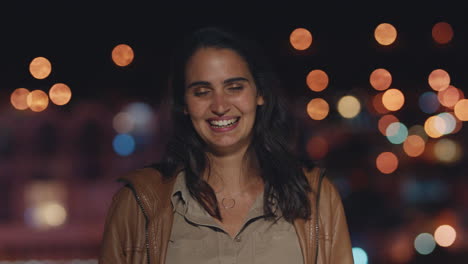 portrait-beautiful-caucasian-woman-on-rooftop-at-night-laughing-happy-enjoying-urban-nightlife-with-bokeh-city-lights-in-background