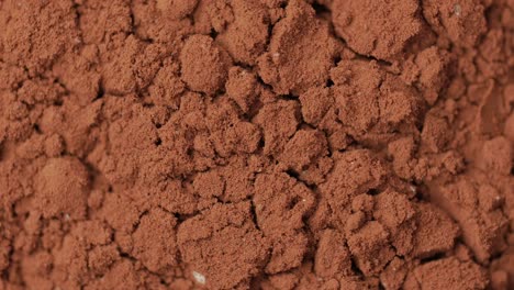 rotating cacao powder macro shot