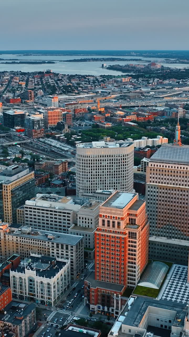 View of 200 Clarendon Street, previously John Hancock Tower in the Back Bay neighborhood of Boston. Top view. City scenery after sunset.. Vertical video