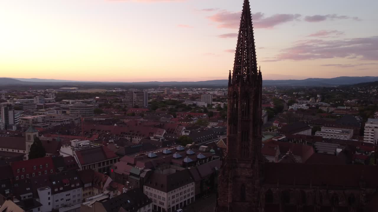 Freiburg Cathedral aerial shot circular panorama around holding on rule of thirds