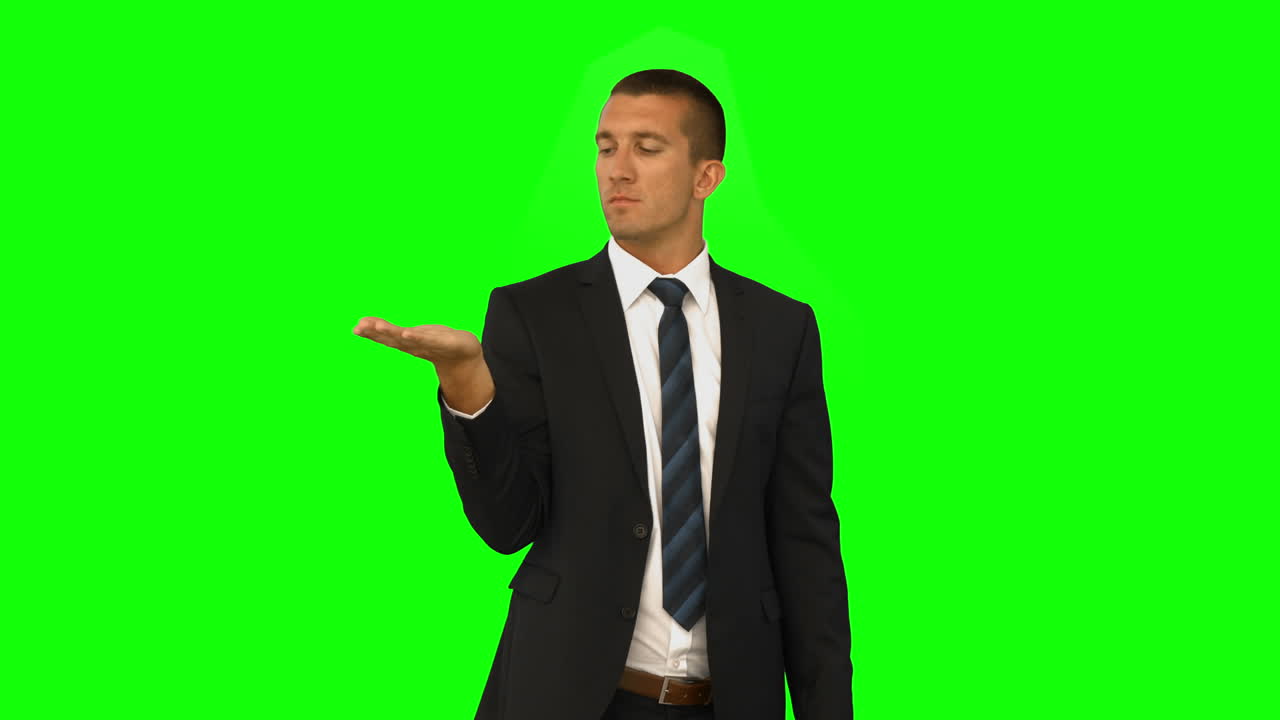 Businessman presenting with hand