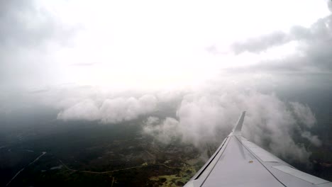 aeroplane flight above clouds