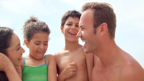 Happy-family-standing-together