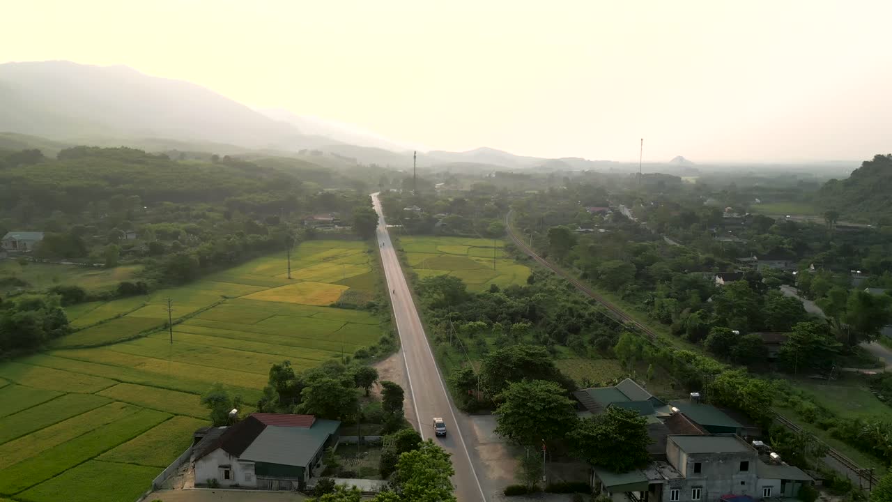 Vietnamese Rural Landscape with Road and Paddy Fields