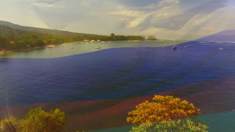 animación de la bandera de colombia ondeando sobre el paisaje de la playa