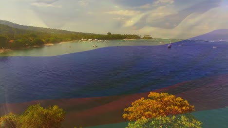 animation of flag of colombia blowing over beach landscape