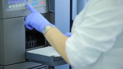 scientist working with laboratory equipment