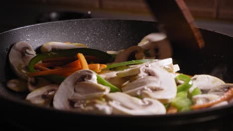 cooking vegetables and mushrooms in a steaming hot pan, japanese food