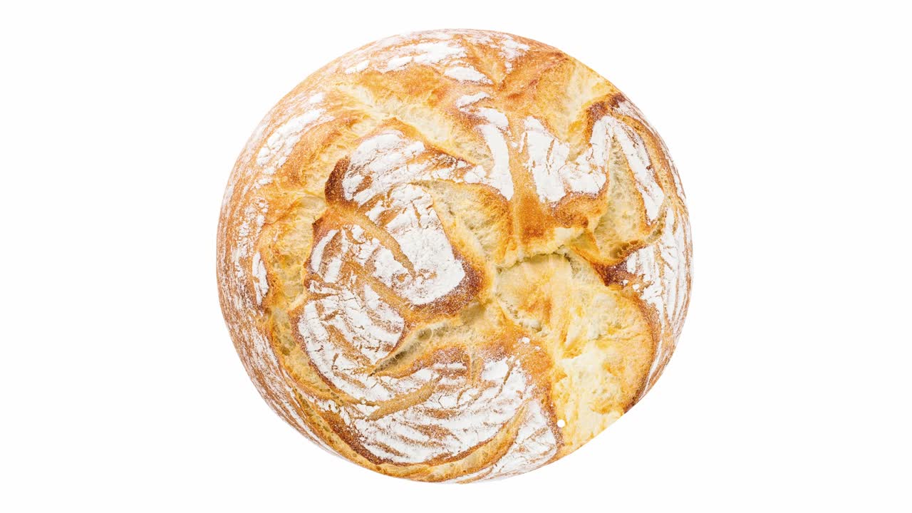 круглый белый хлеб, вращающийся, крупный макрос, вид сверху.