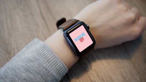 smart watch - deadline message on display - close up - slow motion