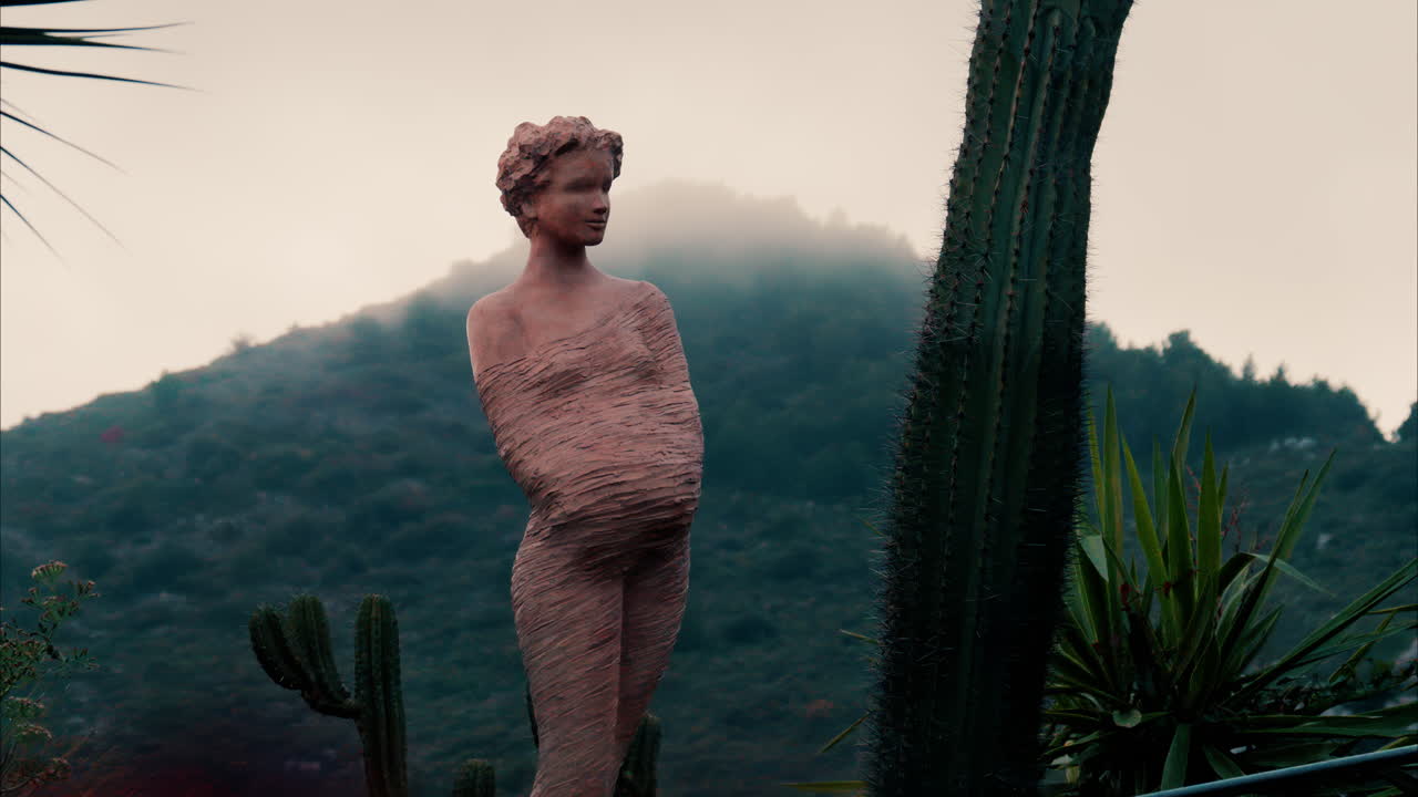 Woman statue by Jean-Philippe Richard in The Jardin Exotique d'Eze in France