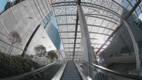 milan city curved glass buildings in modern downtown business square. italy