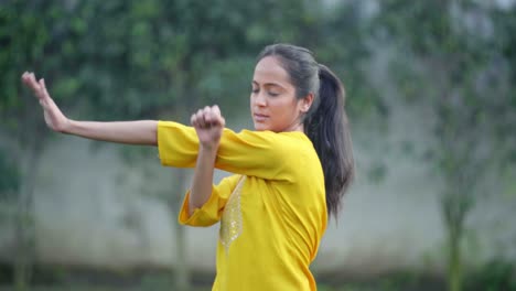 Indian-girl-doing-hand-stretch-exercise