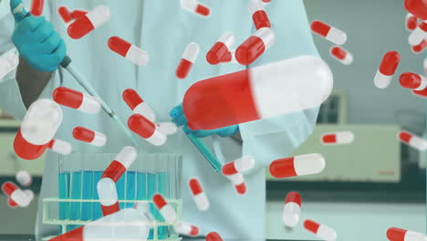 animation of pills over african american male scientist working in lab