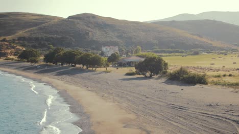 beautiful natural sandy beach along coast of lesvos island, greece