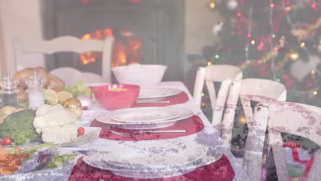 animation of table set for christmas meal over winter scenery