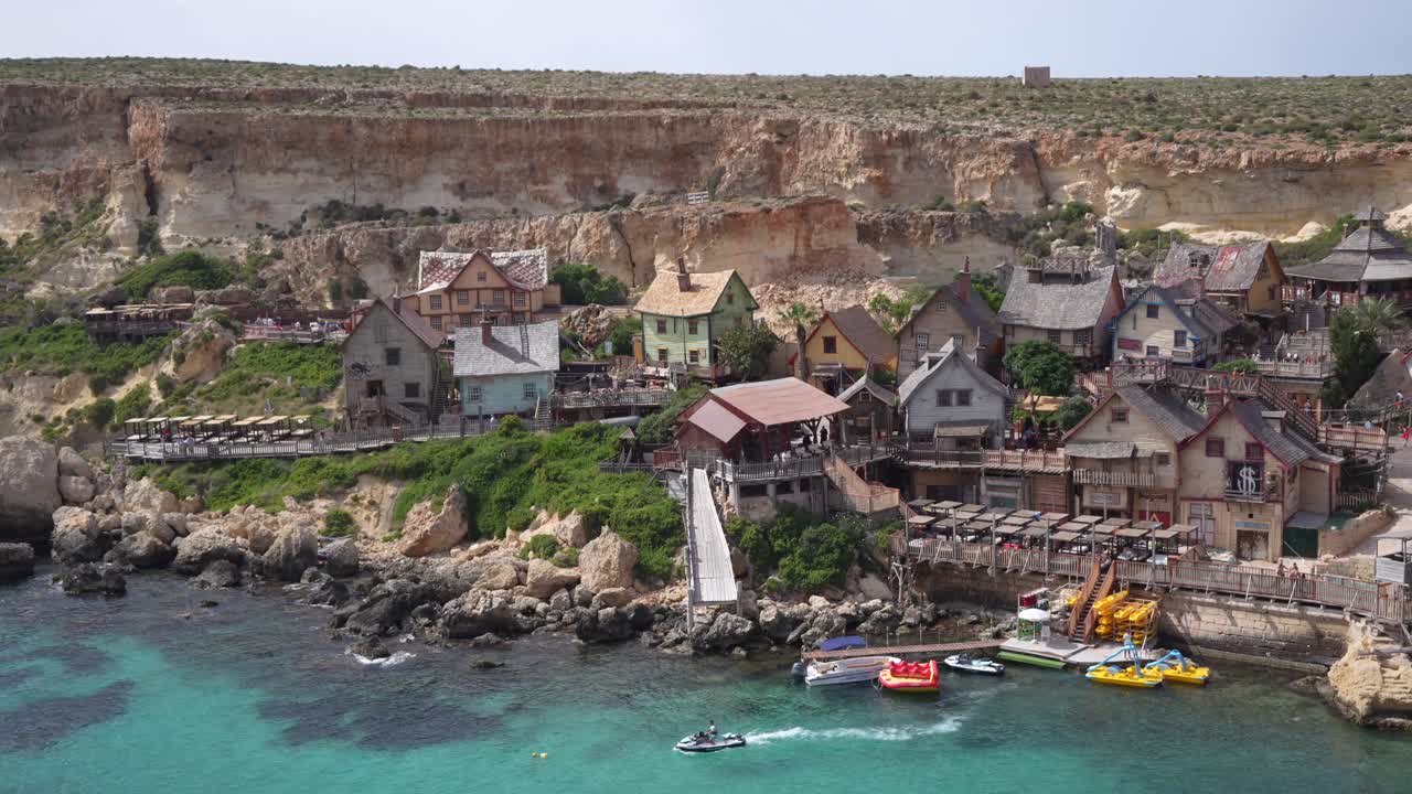 Scenic Views of Popeye Village, in Malta, with rustic and ramshackle wooden huts