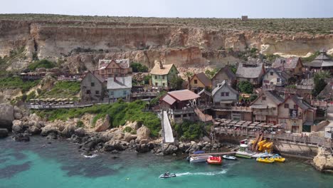 scenic views of popeye village, in malta, with rustic and ramshackle wooden huts