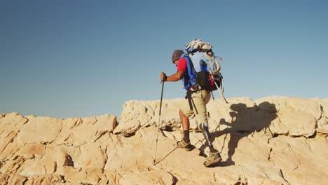 mixed race man with prosthetic leg hiking in nature