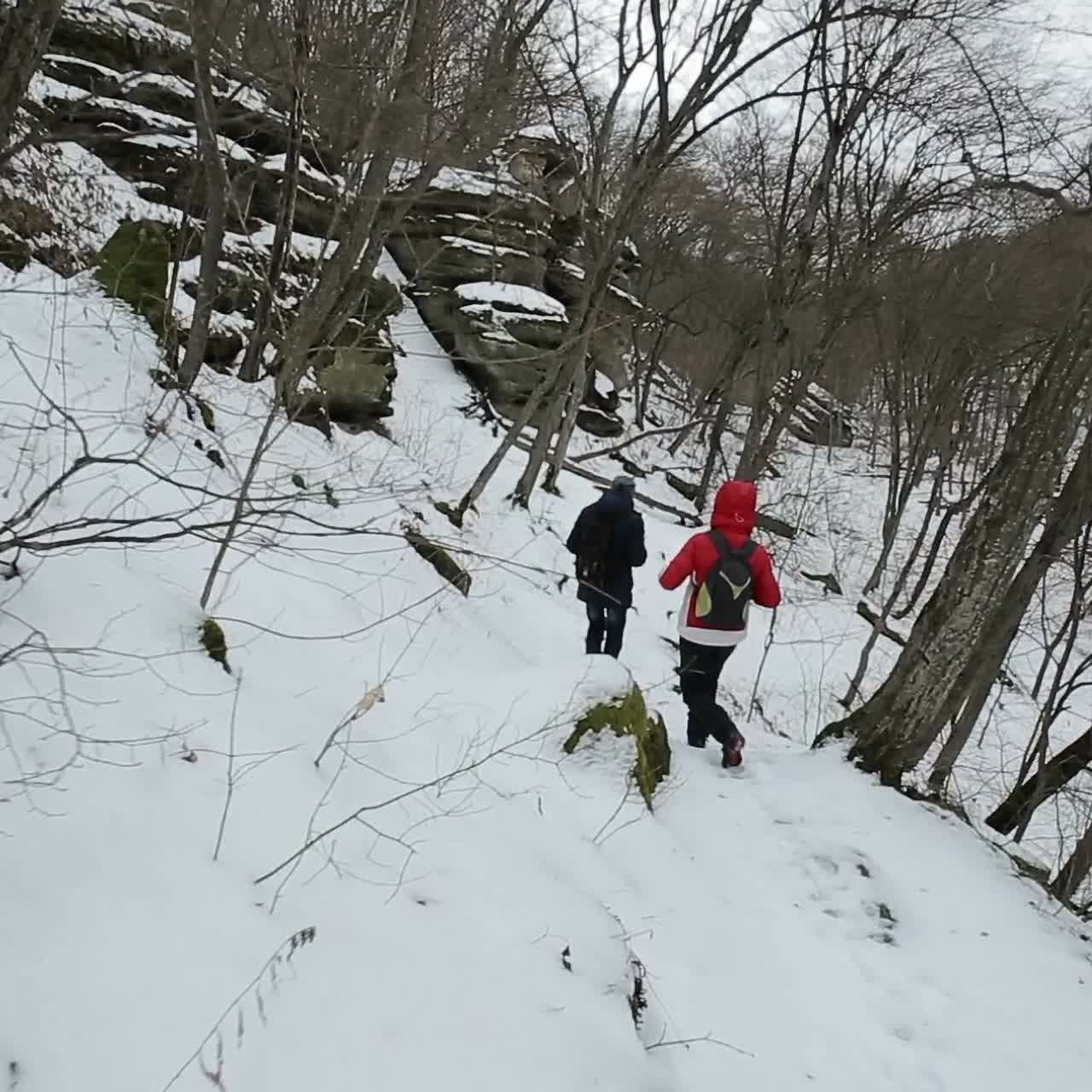 Man and woman in snowy hills