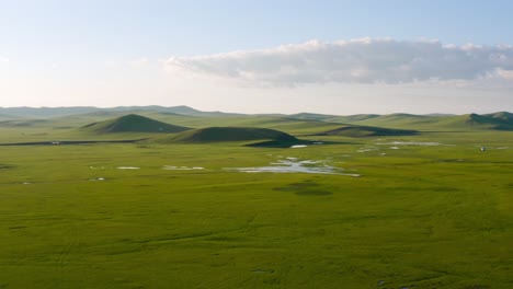 aerial view green grassland and hills in morigele river, hulun buir, china