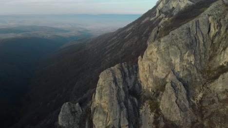 aerial shot of mountain hill with forest and cliffs-2