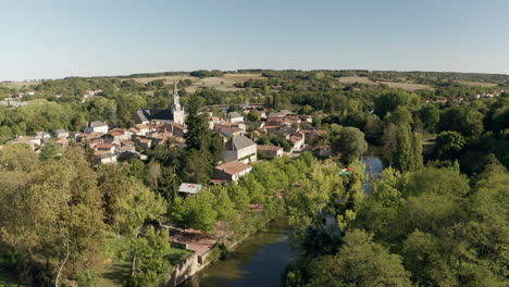 Aerial-drone-point-of-view-of-the-village-of-Saint-Loup-Lamaire-in-Deux-Sevres,-France