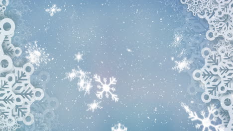animación de copos de nieve cayendo sobre un fondo azul