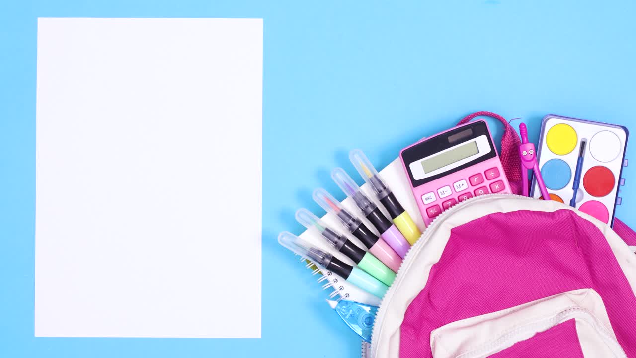 School backpack with school stationery and white wrapped paper for text appear on blue theme. Stop motion