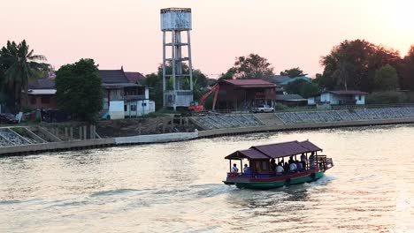 a boat carrying tourists on a river