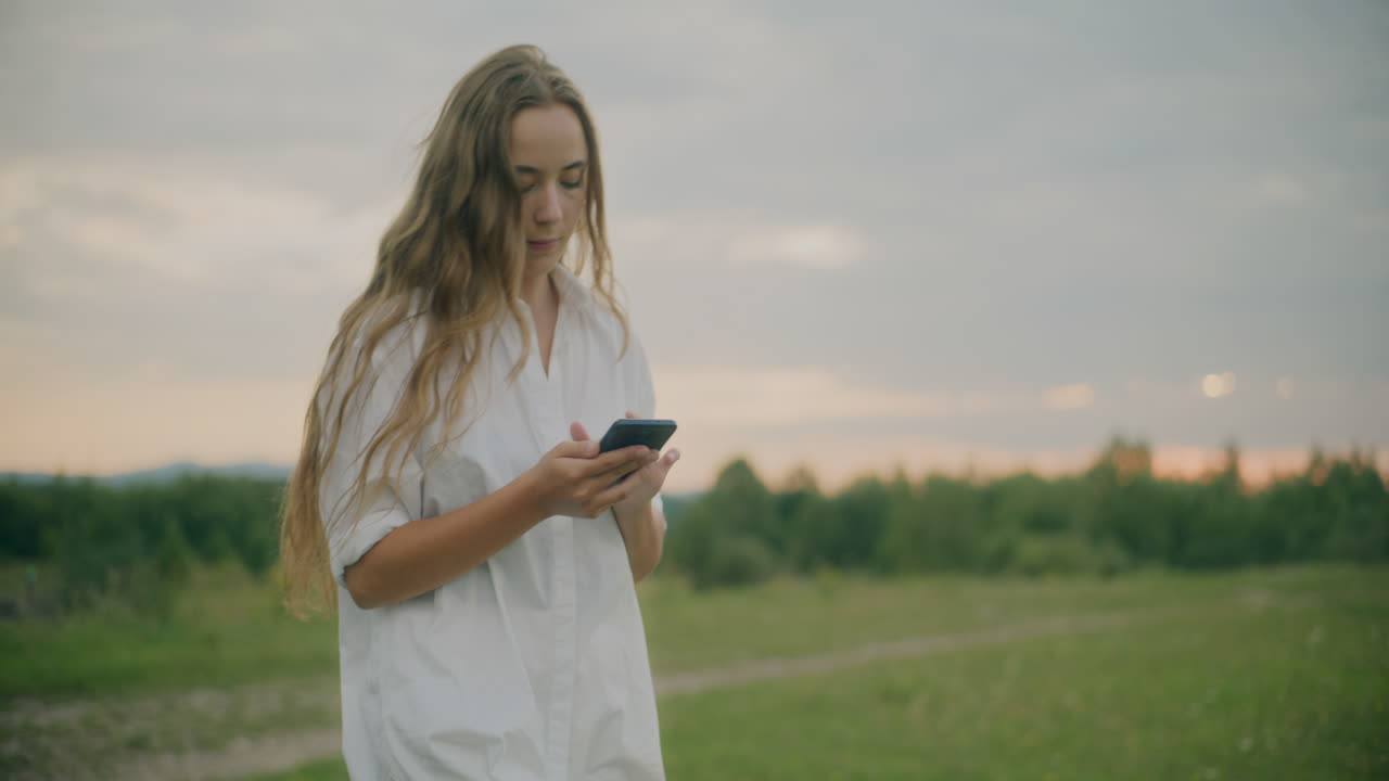 Woman Walking Browsing Social Media