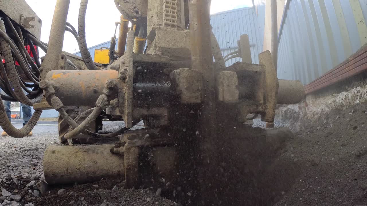 Powerful hydraulic drilling rig, Foundations of stone. Soil reinforcement for building construction, Soil drilling and removal of steel pipes