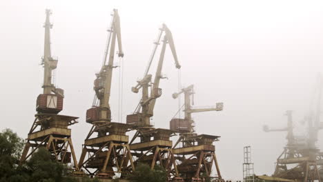 River-port-cranes-in-the-fog---Danube-river-in-Austria-2