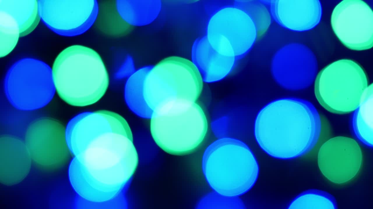 abstracto aislado borroso luces festivas amarillo-naranja con bokeh. concepto de vacaciones telón de fondo con formas brillantes parpadeantes luces de árbol de navidad parpadeante