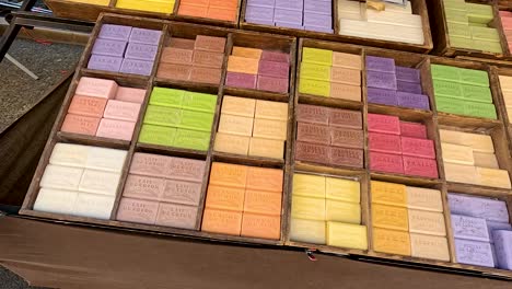 various soaps arranged in a market stall