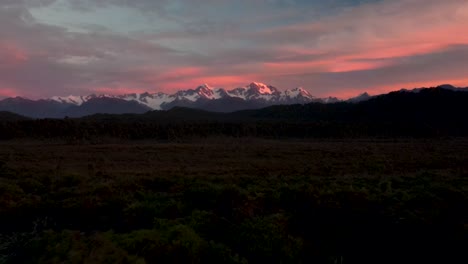 Southern-Alps,-New-Zealand---Aerial-view-of-mountain-range-and-dawn-colorful-sky,-natural-scenic-landscape