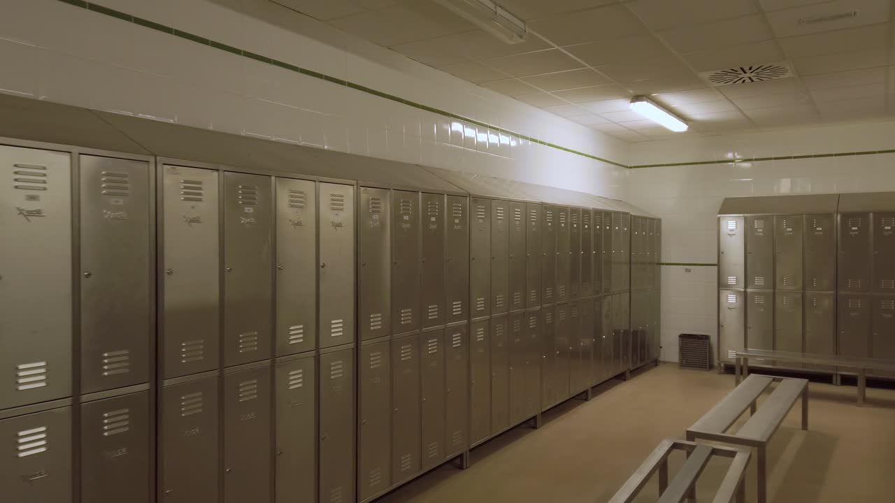 Rows of Metal Lockers in a Clean and Organized Locker Room