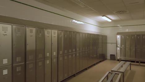 rows of metal lockers in a clean and organized locker room
