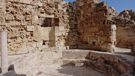 Ancient-limestone-pool-without-water-in-city-of-Salamis,-Cyprus