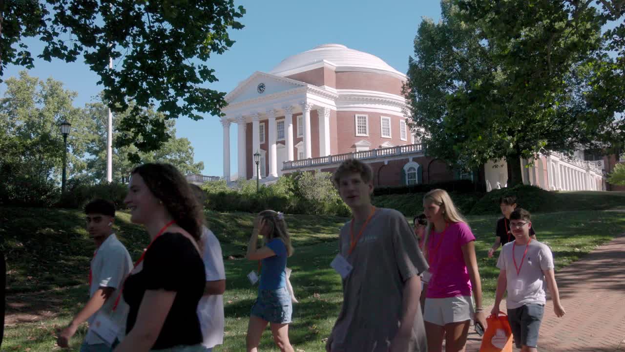 The Rotunda on the campus of the University of Virginia in Charlottesville, Virginia with students walking and video wide shot.