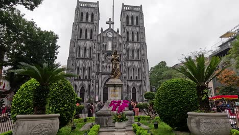 gothic architecture amidst lush greenery in hanoi