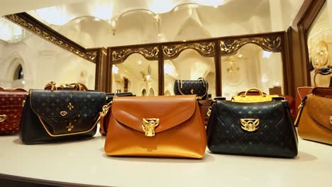 luxury handbags on display in a boutique