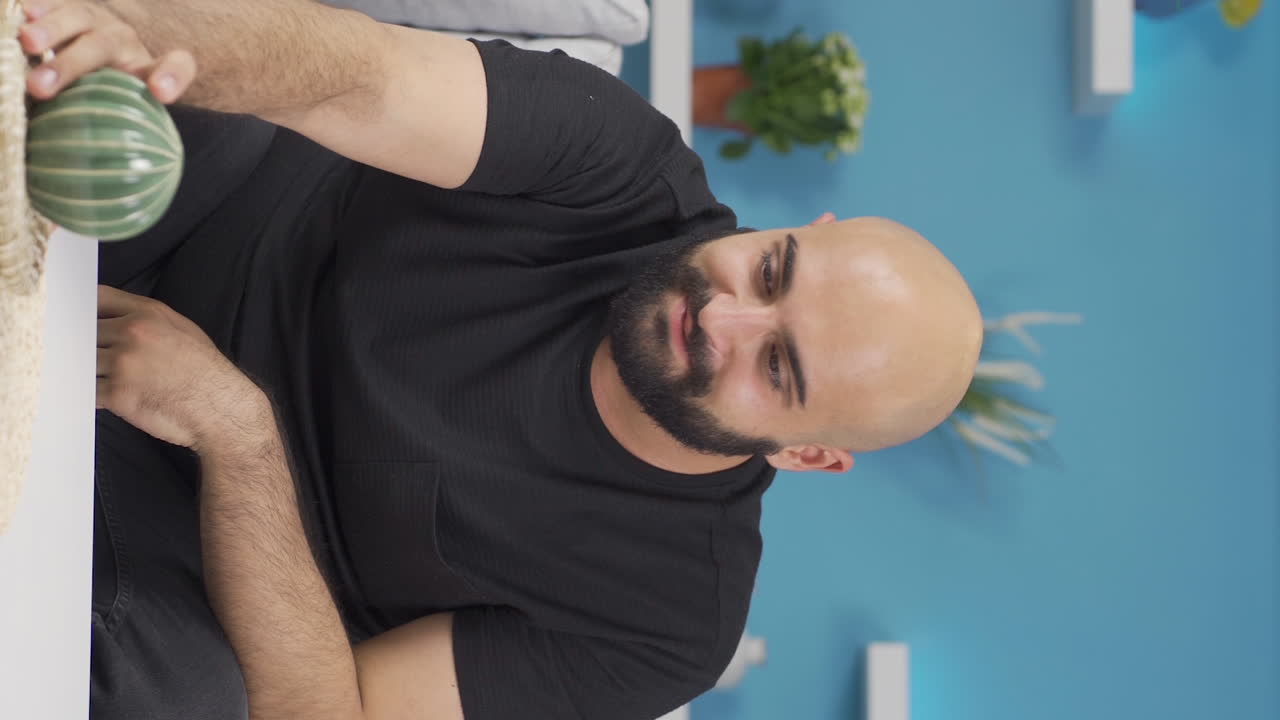 Vertical video of Happy and peaceful man.