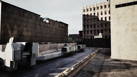 a view of a rooftop with industrial equipment in a city