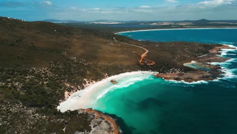 aerial of little beach in two people bay, near the town of albany in western australia on a suny day with few clouds in the sky
