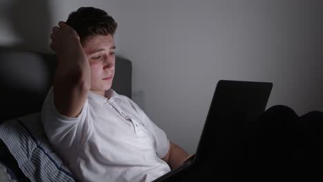 Teenage-Victim-Of-Cyber-Bullying-Using-Laptop-Shot-On-R3D